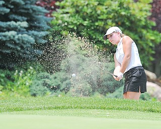 Nicolette Eddy of Kennedy chips out of the bunker on the 12th hole at Salem Golf Club during Monday’s Greatest Juniors qualifier. It was a difficult afternoon for Eddy and most of the golfers, but four more juniors earned a spot in the championship on July 27 at Avalon Lakes Golf Club.