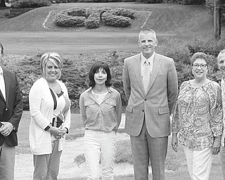 ROBERT K. YOSAY | THE VINDICATOR:
The Hope House Visitation Center of Youngstown has planned a fundraiser in the form of a golf outing, to take place Aug. 15 at the Youngstown Country Club. Ray “Boom Boom” Mancini will be the celebrity golfer. From left to right are A.J. Turner, Maria Meadors, Denise DeBartolo York, Matt Taylor, Carole Bopp and Mancini.