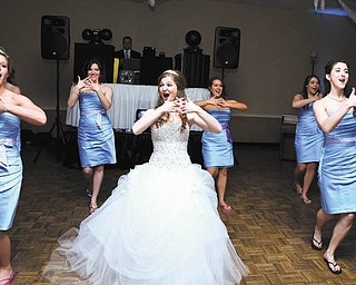 On May 25 at the Turek-Brown wedding, bride and bridesmaids choreographed and performed a dance for the groom and groomsmen. They are Janice Abrams of North Royalton, Elysia Shutrump of NYC, the bride, Kayla Turek Brown, Courtney Larson of Canfield, Lynnette Enterline of Boardman and Lauren Walker of Northport, Ala. The reception was held at the Embassy. Submitted by the bride’s mother, Sally Turek of Canfield.