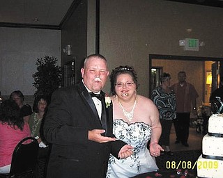 This is Mike and Lisa Kuty at their wedding reception, Aug. 8, 2009. Sent by Lisa of Girard.