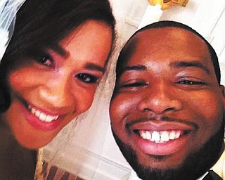 Alyssa Monroe and Alexander Lalanne were married on May 31 at First Presbyterian Church in Youngstown. They reside in Fairfax, VA. Once they were pronounced husband and wife, the groom announced that he had to take a "selfie" and snapped this picture. He surprised everyone and all had a laugh before they kissed. Submitted by Jeanne Cotters Monroe, mother of the bride.