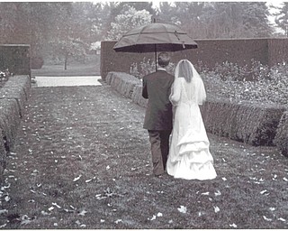 Jim and Lynda Markos, Oct. 9, 2009, their wedding day, as they leave the Rose Garden in Mill Creek Park. Sent by Margie Goldner, Lynda's Mom who loves that it looks like the photo could have been taken 100 years ago.