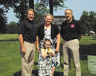 SPECIAL TO THE VINDICATOR
The Four Square Club Foundation’s fifth annual Drive for Hearing will take place Aug. 27 at Mill Creek Golf Course in Boardman. It will benefit Easter Seals and Youngstown Hearing & Speech Center. In front is Cyprus Blosser, Easter Seals and YHS 2014 child representative. In back are Jeff Michalenok, left, Four Square Club golf outing chairman; Susan Berny, Easter Seals and YHS board chairwoman; and Tim Nelson, Easter Seals and YHS president and chief executive officer.
