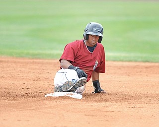 Scrappers baserunner Ordomar Valdez sits at second base for a moment after being tagged out in a rundown to end the fifth inning of Sunday’s New York-Penn League game against the Batavia Muckdogs at Eastwood Field in Niles. The Muckdogs downed the Scrappers, 5-3, and swept the series, 3-0.