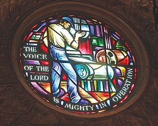 This window at St. John’s Episcopal Church in Youngstown depicts shaping the steel. The associated Psalm 29 refers to God speaking in the midst of industry. 