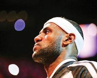 Miami Heat forward LeBron James during the pre-game ceremony in Game 4 of the NBA basketball finals against the San Antonio Spurs, Thursday, June 12, 2014, in Miami. 