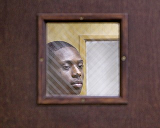 A Bit more subdued as Ricki D Williams is led into Austintown Court for a hearing by sheriff deputy .