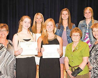 SPECIAL TO THE VINDICATOR
Austintown Junior Women’s League recently awarded five $500 scholarships to seniors at Austintown Fitch High School. In front, from left, are Kathy Rusback, AJWL president; Zoe Logston and Sarah Melfe, scholarship winners; and Shirley Schmidt and Janice Simmerman, scholarship committee members. In back are Julie Larkin, Samantha Ferguson and Courtney Dockry, scholarship recipients.