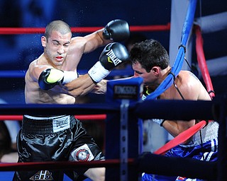 PITTSBURGH, PENNSYLVANIA - JULY 11, 2014: Jake Giuriceo is punched in the head by Travis Hartman during a welterweight bout Friday night at Rivers Casino. Giuriceo would win via 4th round TKO. (Photo by David Dermer/Youngstown Vindicator)