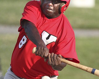 William D. Lewis The Vindicator .Senior Baseball player Charlie Harris, 74, of Youngstown plays for Youngstown Classic in an over 58 baseball league at Field of Dreams in Boardman.