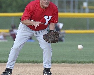 William D. Lewis The Vindicator .Senior Baseball player Ron DiVincenzo of Boardman 74, play for Youngstown Classic in an over 58 baseball league at Field of Dreams in Boardman.