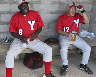 William D. Lewis The Vindicator .Senior Baseball players Charlie Harris, 74, of Youngstown and Ron DiVincenzo, 74,of Boardman play for Youngstown Classic in an over 58 baseball league at Field of Dreams in Boardman.