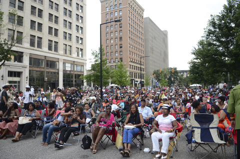 Katie Rickman | The Vindicator.A crowd gathered Saturday night to watch Kim Waters perform at the Jazz Festival downtown July 12, 2014.