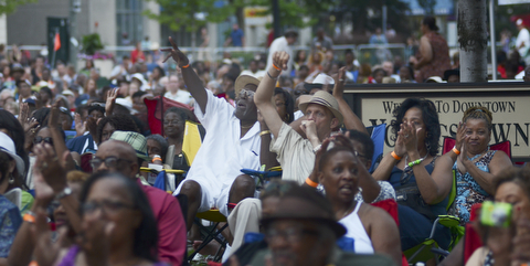 Katie Rickman | The Vindicator.The crowd cheers as Kim Waters finishes his song Red Wine and You at the Jazz Festival downtown July 12, 2014.