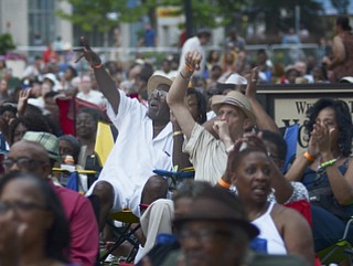 Katie Rickman | The Vindicator.The crowd cheers as Kim Waters finishes his song Red Wine and You at the Jazz Festival downtown July 12, 2014.