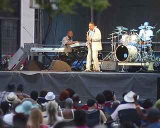 Katie Rickman | The Vindicator.A crowd gathered Saturday evening to watch Kim Waters perform during the Jazz Festival downtown.