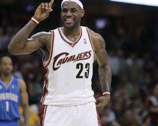 Cleveland Cavaliers' LeBron James celebrates during Game 1 of the NBA Eastern Conference basketball finals against the Orlando Magic Wednesday, May 20, 2009, in Cleveland. (AP Photo/Tony Dejak)