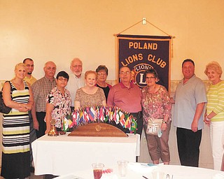 SPECIAL TO THE VINDICATOR
Poland Lions Club recently celebrated 20 years of service to the community. Members attending the charter celebration, from left, are Becca and Tim Young, new members; Paul Young, charter member; Judy Young, zone chairwoman and charter member; Charles Maholtz; Lori Gentile, treasurer; Monica Maholtz, King Lion and charter member; Jerome Gentile, first vice president; Loretta Esasky, secretary; Patrick Lyons, new member; and Sue Perry.