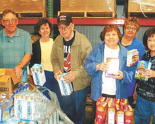 SPECIAL TO THE VINDICATOR
Jerry Carleton, left, Betty Jean Bahmer, Joe Bahmer, Connie Brown, Sandy Bilovesky and Loren Gargano, members of Trumbull Retired Teachers Association, recently donated a day of service at Second Harvest Food Bank. TRTA’s next meeting will be Aug. 12 at Ciminero’s Banquet Centre, 123 N. Main St. in Niles.