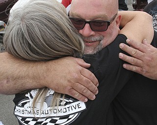 william D. Lewis The Vindicator  Fat and Furious cast member Tommy Christmas gets a hug from fan Patty Shobel of Austintown during a car show at Quaker Steak and Lube in Boardman.