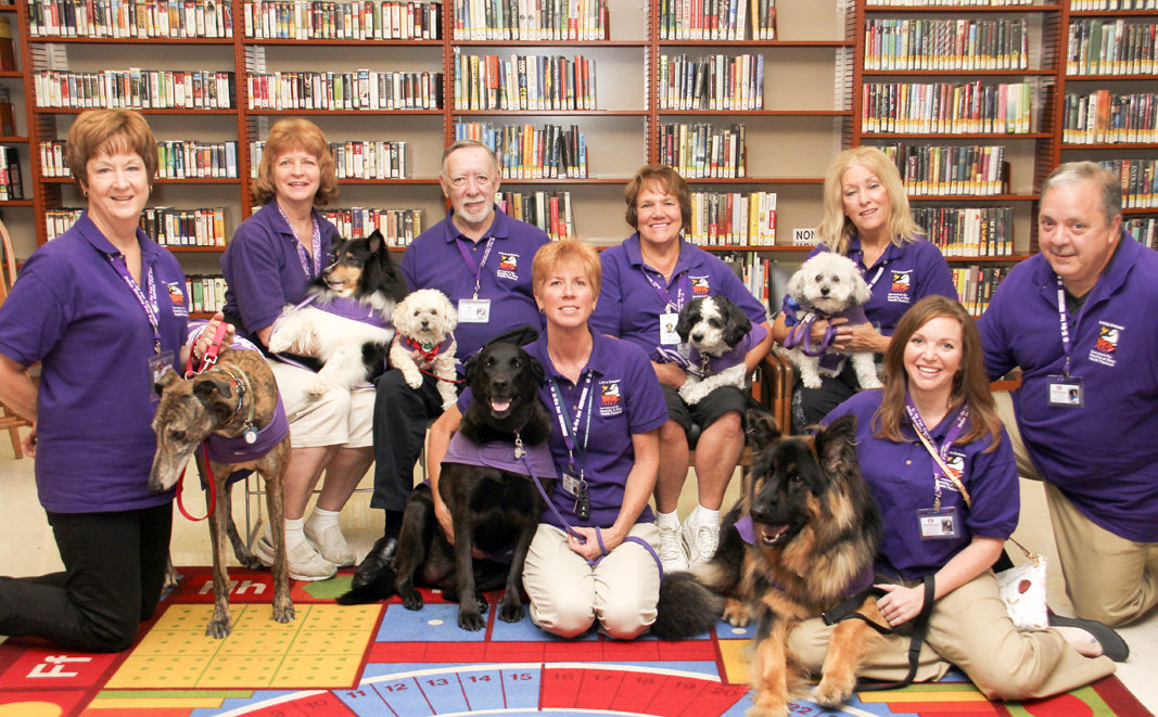 Members of K-9's for compassion, a pet partners affiliate, visited guests at the Brownlee Woods branch of the Public Library of Youngstown on Saturday afternoon.   Dustin Livesay  |   The Vindicator 7/19/14  Youngstown.