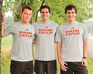 Matt Yager, left, Greg Delost and Mike Delost are directors for the Run for Caitlin 8K and 3K run/walk set for
Saturday. The fundraiser run honors Yager’s sister Caitlin who was killed in a car accident last December.