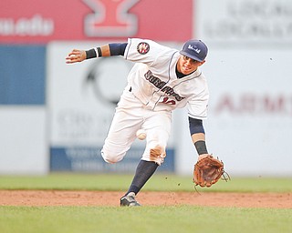 Scrappers infielder Yonathan Mendoza charges a ground ball during Monday’s 7-0 victory over Aberdeen at Eastwood Field in Niles.