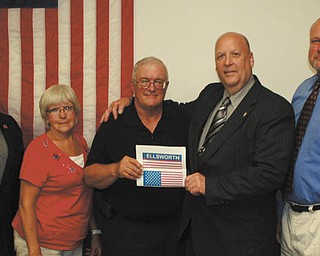 SPECIAL TO THE VINDICATOR
The Berlin-Ellsworth Ruritan Club presented the Ellsworth Township trustees with a check for $580 for four new flags that will be displayed in the township. The new flags will hang as banners. Two are American flags and two are Ellsworth flags. Denny Furman, representing the Ruritan Club, presented the check. From left to right are Artie Spellman, trustee; Karen Grittie, fiscal officer; Fred Houston, trustee; Furman; and Bob Toman, trustee.