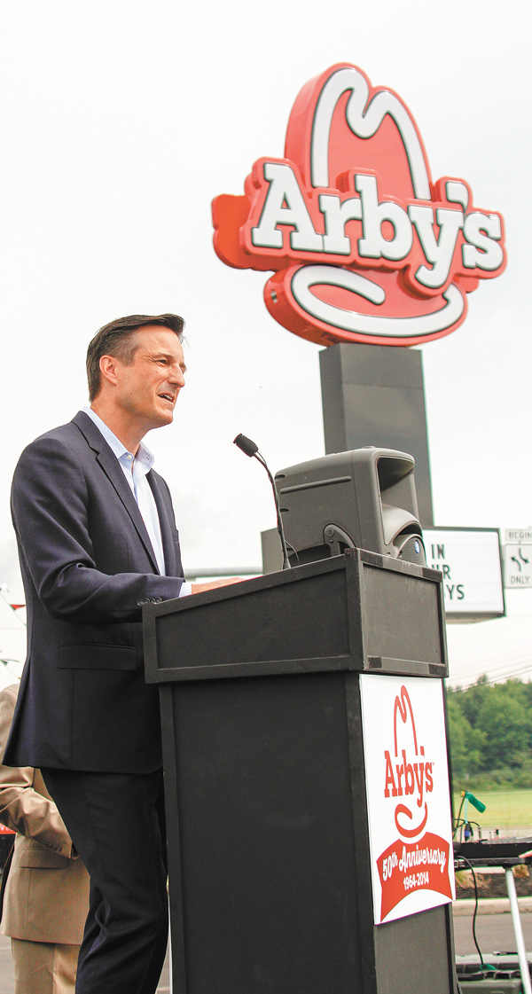 Paul Brown, chief executive officer of Arby’s, speaks at the fast-food chain’s 50th anniversary celebration in Champion. He spoke Wednesday about the Mahoning Valley’s impact on the global brand that started in Boardman on July 23, 1964.