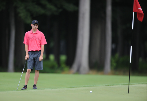 WARREN, OHIO - JULY 27, 2014: Bradley Miler reacts after his putt came up shot of the hole on the 14th hole Sunday afternoon at Avalon Lakes Country Club during the Vindy Greatest Golfer Tournament. (Photo by David Dermer/Youngstown Vindicator)