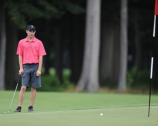 WARREN, OHIO - JULY 27, 2014: Bradley Miler reacts after his putt came up shot of the hole on the 14th hole Sunday afternoon at Avalon Lakes Country Club during the Vindy Greatest Golfer Tournament. (Photo by David Dermer/Youngstown Vindicator)