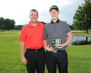 WARREN, OHIO - JULY 27, 2014: Nolan Snyder poses for a picture with club pro Cory Pagliarini Sunday evening at avalon Lakes Country Club. (Photo by David Dermer/Youngstown Vindicator)
