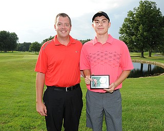 WARREN, OHIO - JULY 27, 2014: Bradley Miller poses for a picture with club pro Cory Pagliarini Sunday evening at avalon Lakes Country Club. (Photo by David Dermer/Youngstown Vindicator)