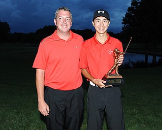 WARREN, OHIO - JULY 27, 2014: Jared Wilson poses for a picture with club pro Cory Pagliarini Sunday evening at avalon Lakes Country Club. (Photo by David Dermer/Youngstown Vindicator)