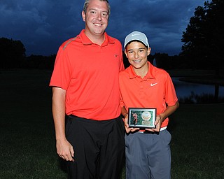 WARREN, OHIO - JULY 27, 2014: Jimmy Graham poses for a picture with club pro Cory Pagliarini Sunday evening at avalon Lakes Country Club. (Photo by David Dermer/Youngstown Vindicator)