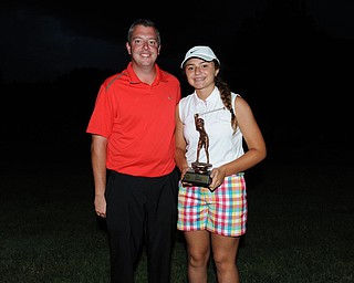 WARREN, OHIO - JULY 27, 2014: Jenna Vivo poses for a picture with club pro Cory Pagliarini Sunday evening at avalon Lakes Country Club. (Photo by David Dermer/Youngstown Vindicator)
