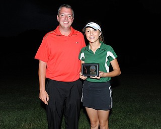 WARREN, OHIO - JULY 27, 2014: Britney Jonda poses for a picture with club pro Cory Pagliarini Sunday evening at avalon Lakes Country Club. (Photo by David Dermer/Youngstown Vindicator)