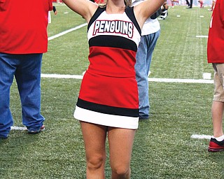 Sarah Holloway, a cheerleader at YSU, has had four concussions: two from playing soccer and two from cheerleading.