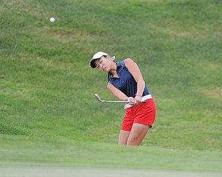 Jacinta Pikunas chips onto the green from the bunker on the 18th hole Sunday afternoon at Avalon Lakes Golf and Country Club in Howland during The Vindicator Greatest Golfer of the Valley Junior Championships. Pikunas won the 17-U Division with 68.