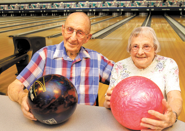 Gil and Doris Frank of Struthers met at a bowling alley almost seven decades ago. They still bowl together at Holiday Bowl on Youngstown-Poland Road. The couple typically bowls three games on Wednesdays and Fridays in
the summer.