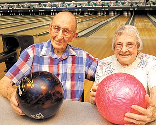 Gil and Doris Frank of Struthers met at a bowling alley almost seven decades ago. They still bowl together at Holiday Bowl on Youngstown-Poland Road. The couple typically bowls three games on Wednesdays and Fridays in
the summer.