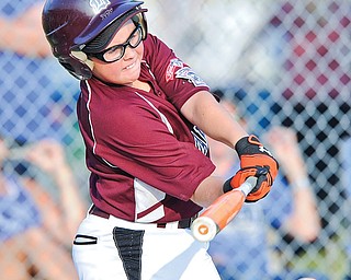 Boardman’s John Hyde connects with a pitch in the bottom of the fifth inning during the Little League Baseball 10-11 state semifinal against Hamilton on Thursday at the Hoover Community Recreation Complex in North Canton. Boardman was shut out, 7-0, to fall into the losers bracket and a meeting with North Canton today.