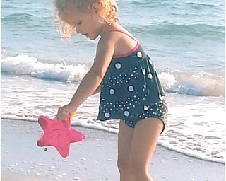 Mena Monroe is having fun at Indian Rocks Beach in Florida. Sent by grandparents Russ and Ellen Monroe.
