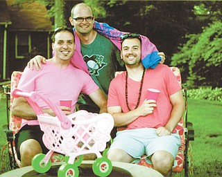 Watching their children swimming in the backyard pool at Grammy and PopPop's are Matt Benson, left, of Liberty; Dustin Wilharm of Asheville, N.C.; and Adam Yankush of Dayton, Ohio, formerly of Youngstown. Submitted by Karen Conklin.