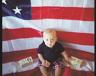 Rocco Joseph Fitzgerald celebrating his first Fourth of July .He is the son of Chad & Kellie Fitzgerald of Chicago . Submitted by grandparents Henry & Patricia Pisciuneri,