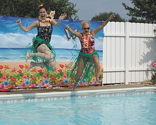Granddaughters of the late Irwin and Elizabeth Ferry gathered at the home of Linda (Burns) Estes in Poland for a day of relaxing in the sun. Cousins, Charon (Jenkins) Cuprik and Barbara (Ferry) Kelly, both of Boardman, jumped into the pool. Submitted by Laurie (Burns) Fox.