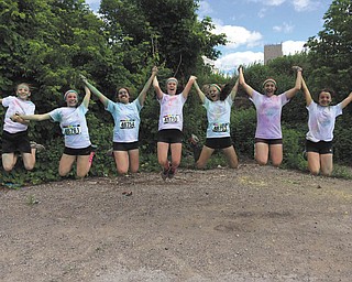 June 14 in downtown Youngstown at the Color Run, this is a group of Jackson Milton middle school girls are resting after finishing the run. From left are Ayla, Sierra, Taylor, Ashley, Emily, Marisa, and Rose. Submitted by Cheryl Jonesco of Lake Milton.