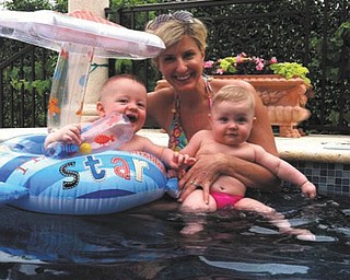 Twins Louie and Lily Coleman with mom, Jen Coleman, enjoying the pool! Submitted by Georgie Peters of Poland.