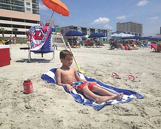 Dominic Theodore, 6, of Boardman, is chillin' at North Myrtle Beach. He is the son of Brad and Amy Theodore. Submitted by Papa John.