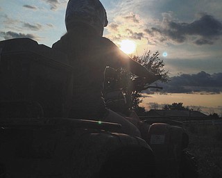Atianna Caggiano of Mineral Ridge is enjoying a ride on her best friend’s four wheeler. Her best friend is Samantha Toth of Austintown.